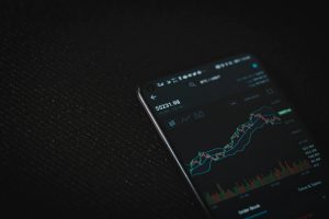 cryptocurrency trading platform dark black tech digital online finance stock graph phone